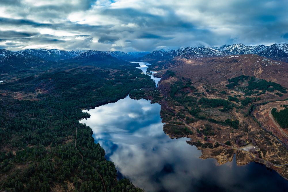 Aerial view of Glen Affric in the Scottish highlands near Canich and Inverness during a cloudy day in winter.