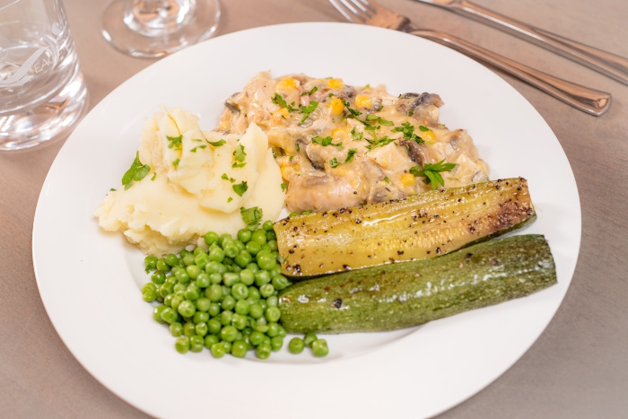 Our chicken casserole, Chicken a la Clan Chief, served with peppered courgettes and mash
