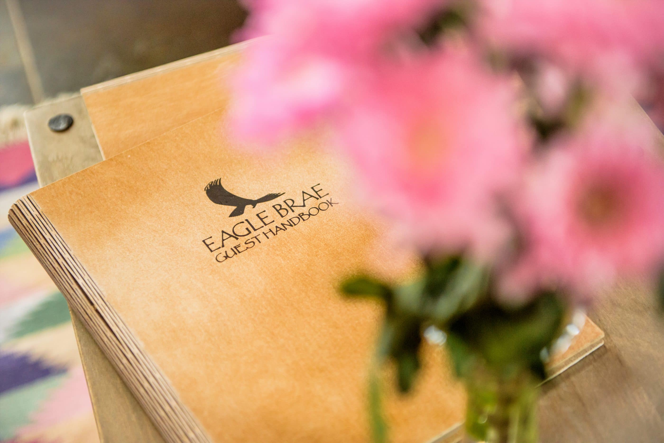 Eagle Brae guest book behind flowers