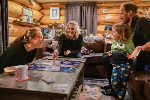 Family playing board games