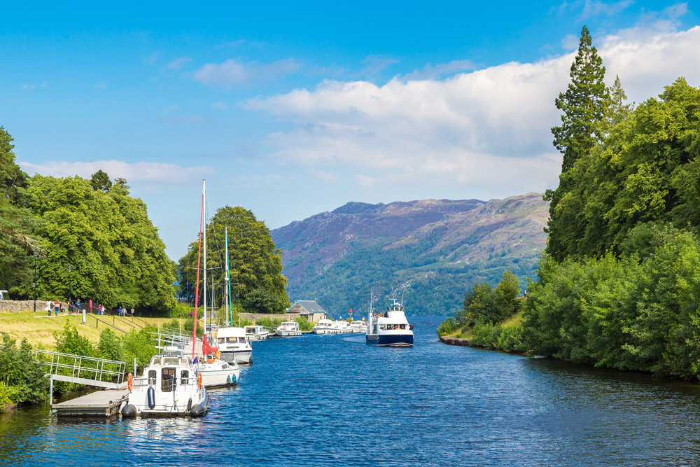 Boats on the water by Loch Ness