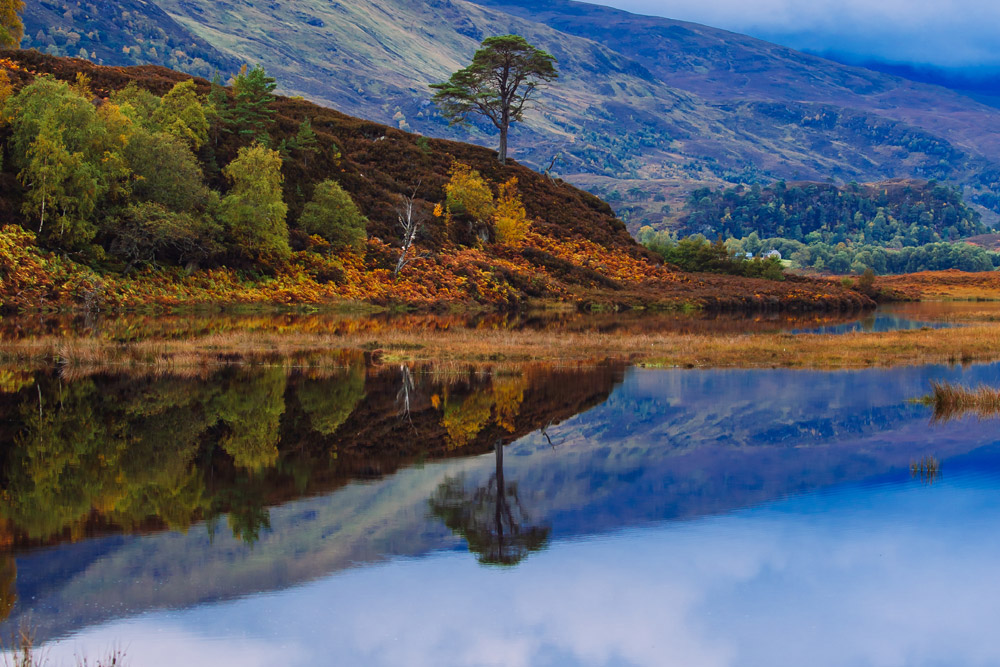 Reflections of the autumn landscape at Glen Strathfarrar