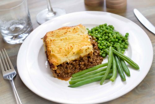 Crofter's pie served with green vegetables