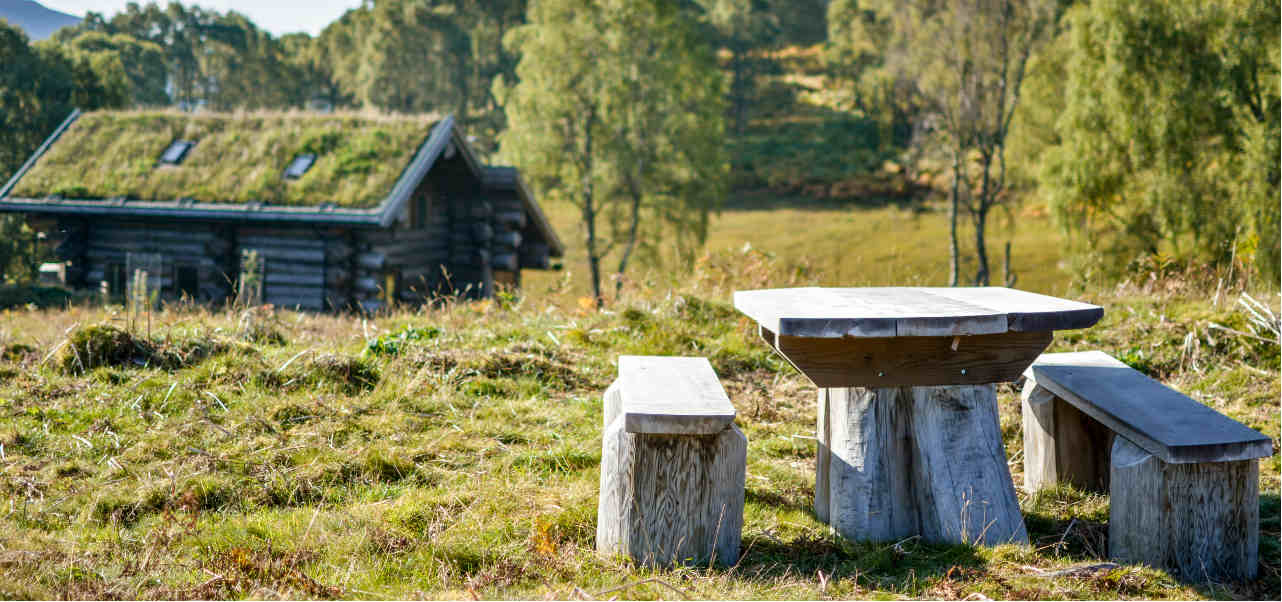 An image of a bench outside one of the Eagle Brae cabins