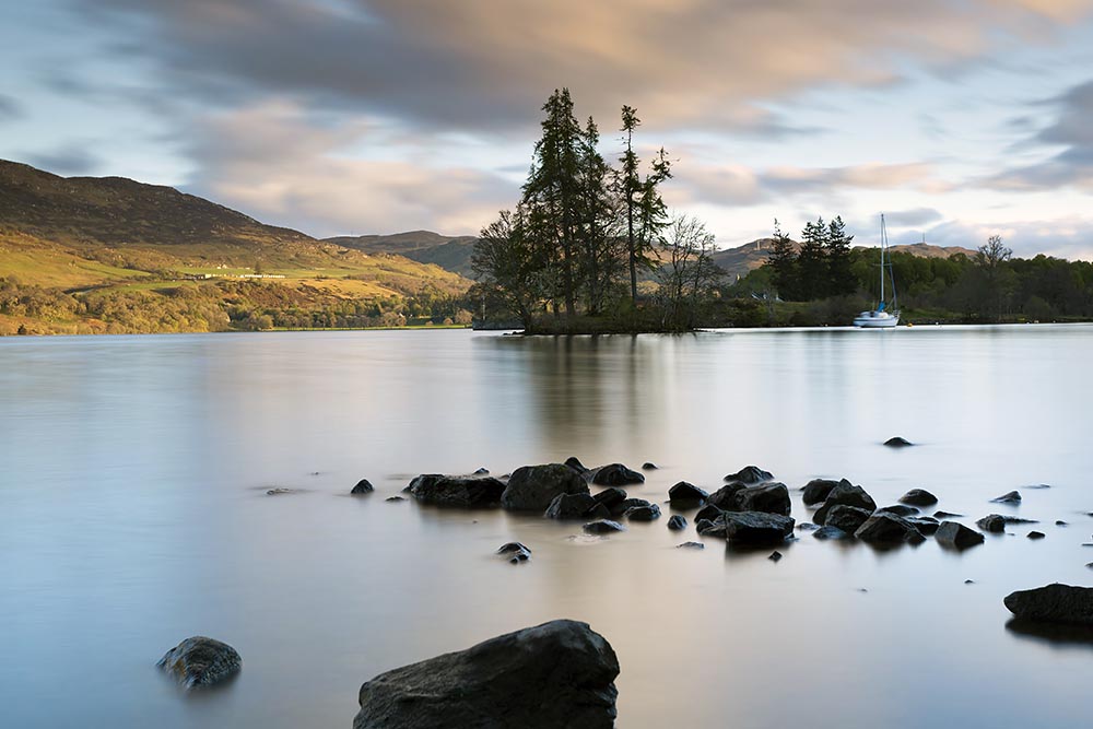 Loch Ness Long exposure shot with hills in the background.