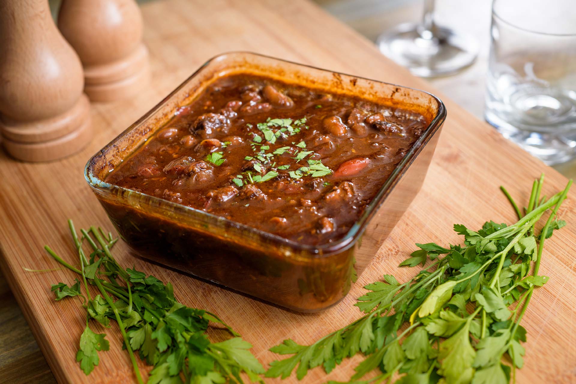 Eagle Brae's Pork Belly and Scotch Bonnet Cassoulet in a casserole dish