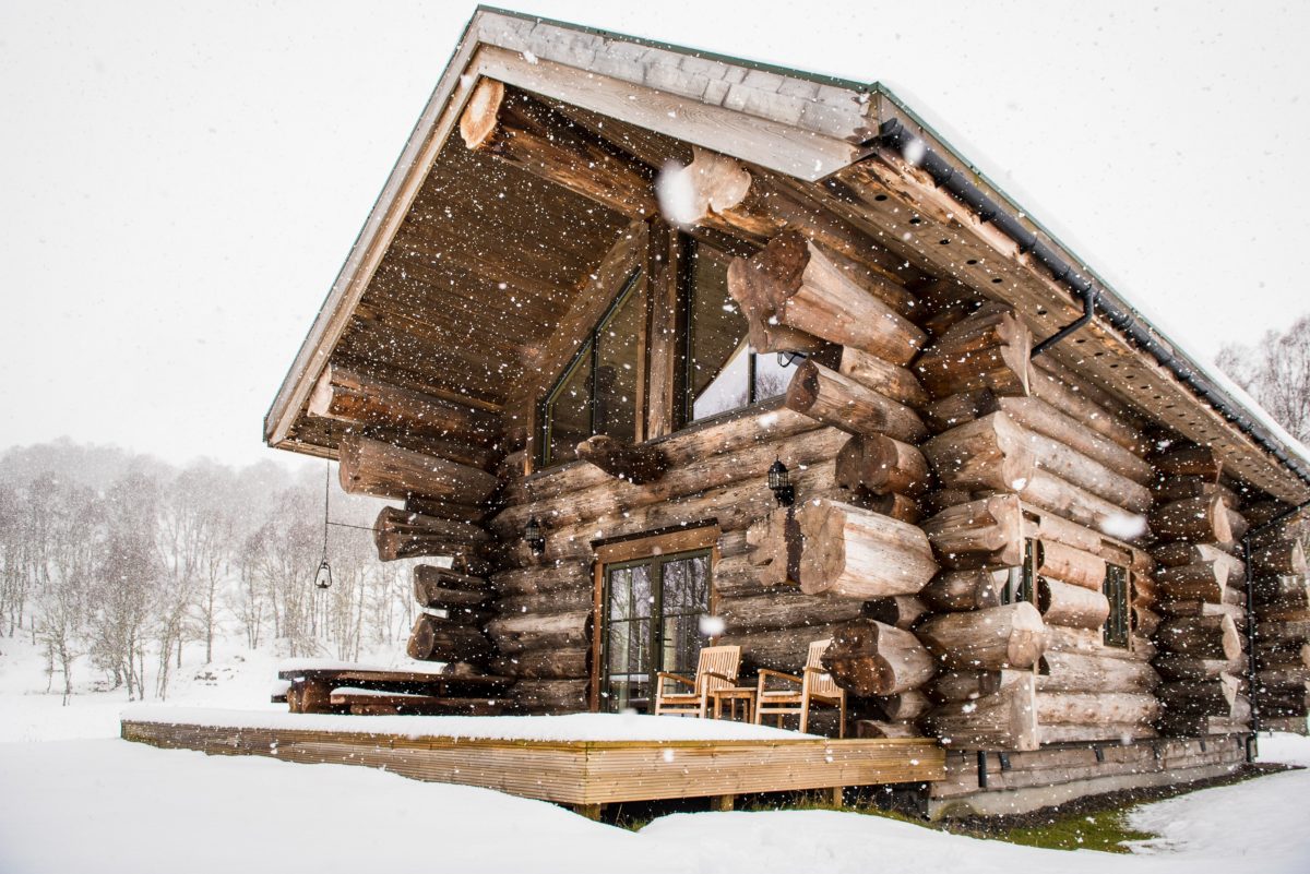 A beautiful log cabin in the snow, Scottish Highlands