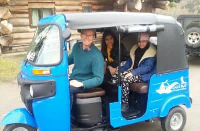 Mike taking guests for a ride in the Tuk Tuk