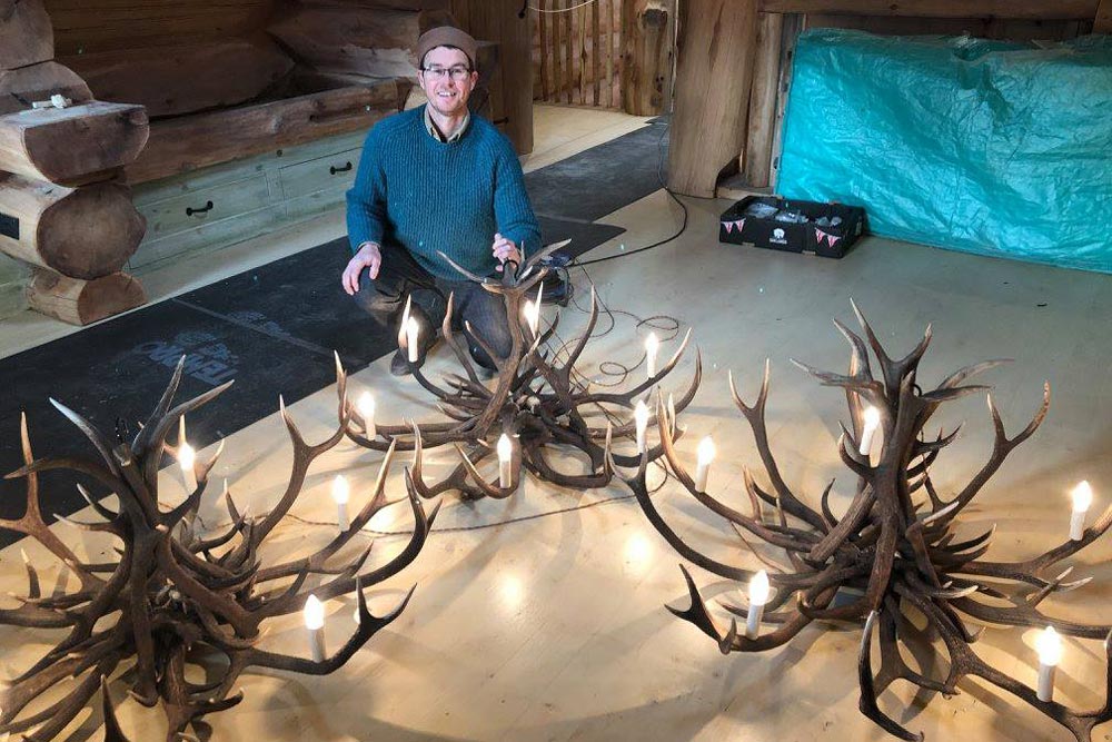 Mike with three finished antler chandeliers