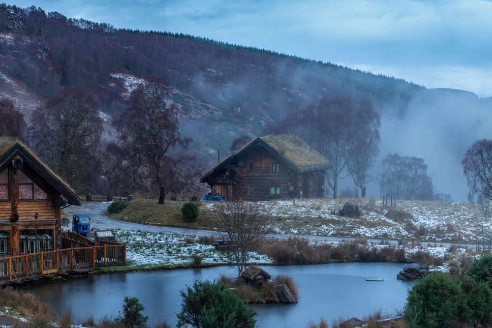 Photo of two of Eagle Brae Cabins in the winter