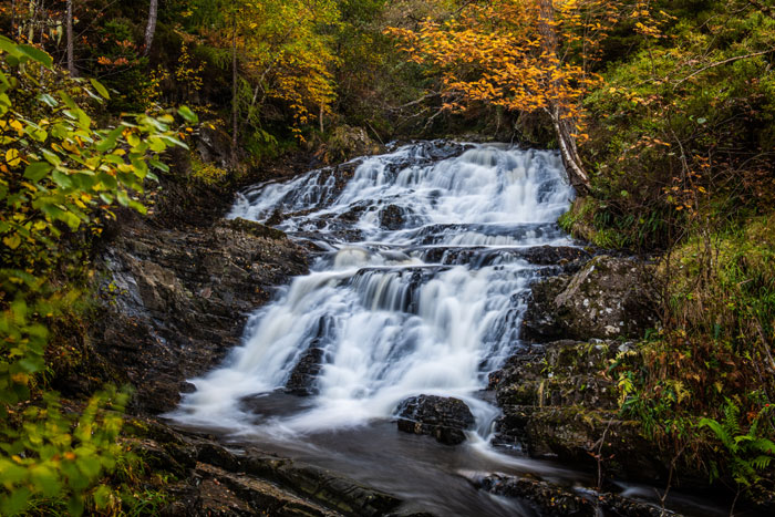 Small waterfalls on the Allt na Bodachan burn above the main drop at Plodda Falls in Glen Affric