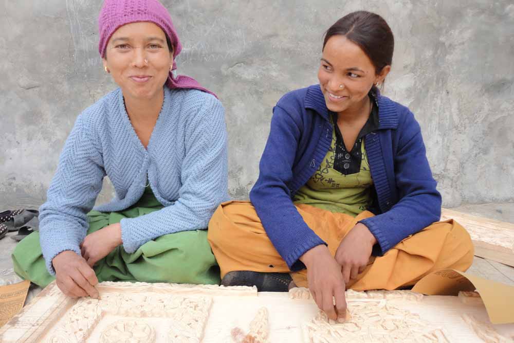 Carvings being sanded in the Indian Himalayas